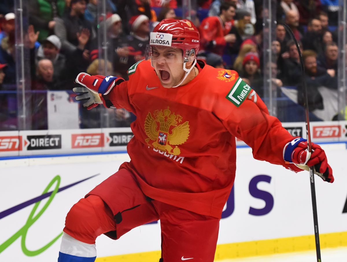 OSTRAVA, CZECH REPUBLIC - DECEMBER 28: Russia's Alexander Khovanov #7 celebrates after scoring a first period goal against Canada during preliminary round action at the 2020 IIHF World Junior Championship at Ostravar Arena on December 28, 2019 in Ostrava, Czech Republic. (Photo by Andrea Cardin/HHOF-IIHF Images)